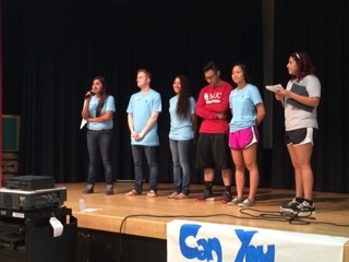 Jenny Nuñez, along with MGC officers, makes an announcement at Fall into Fall.