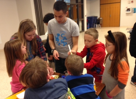 Washington CASP staff help the kiddos make their guac!